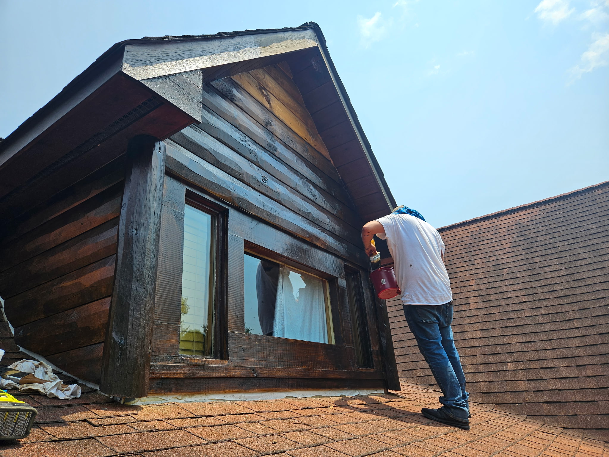 Craftsman staining exterior wood siding